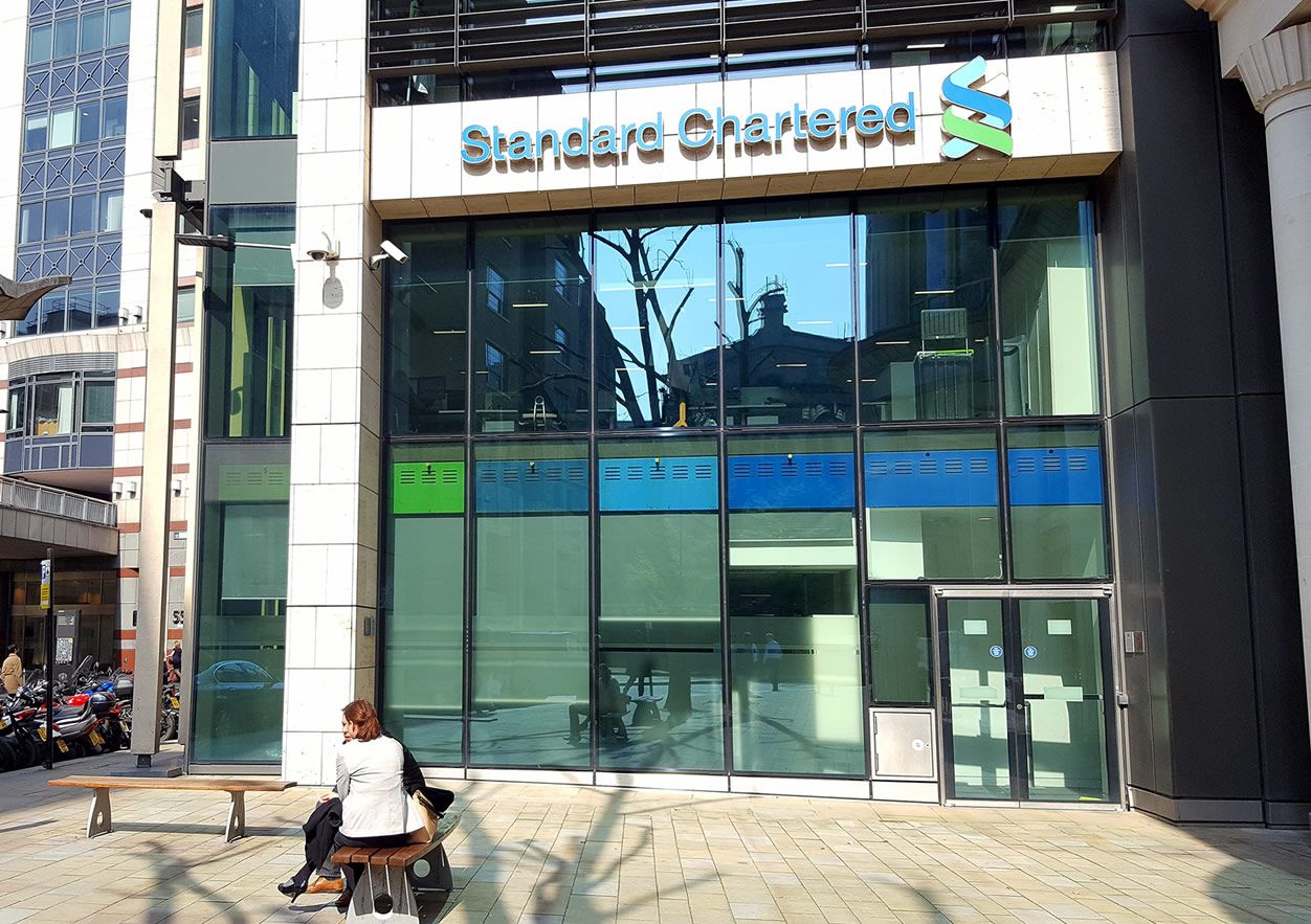 Standard Chartered views on the Dollar and Pound