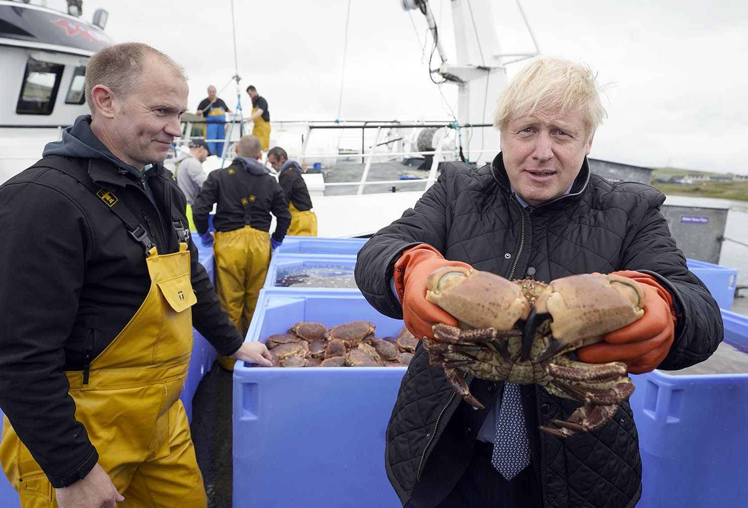 Johnson holding crabs fishing EU