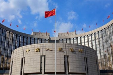 Chinese Renminbi and USD/CNH: An Insight from a PBoC Grandee 